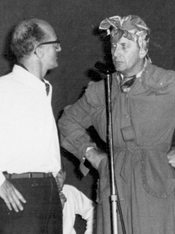 David Murray performing a skit with Jim Redhead during an Island concert