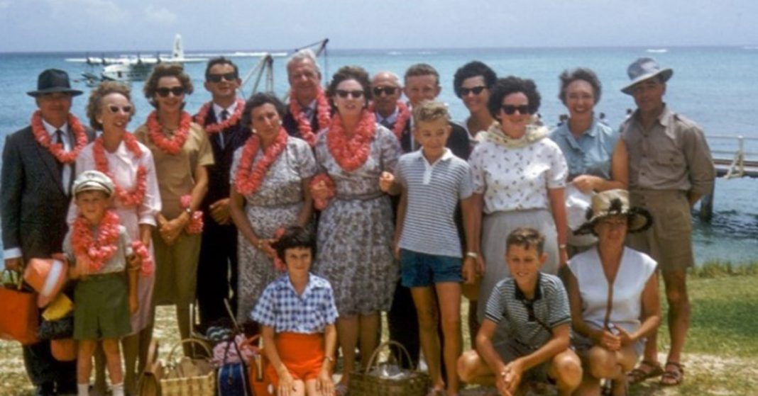 Social gatherings and flower leis were synonymous with flying boat turnarounds at Lord Howe. Photo courtesy of Ian Woodforth (Ian is the young lad second from the right, bottom row).