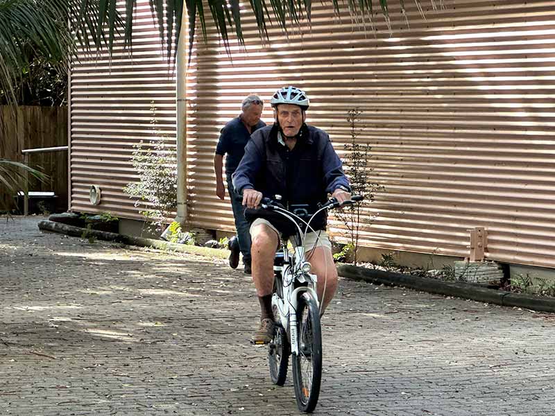 The image is of George Warner on his bike. George recently celebrated his 94th Birthday. He is still enjoying riding around the Island on his bike.