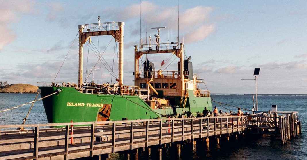 The photo is of the Island Trader docked at Lord Howe Island for weekly unloading.