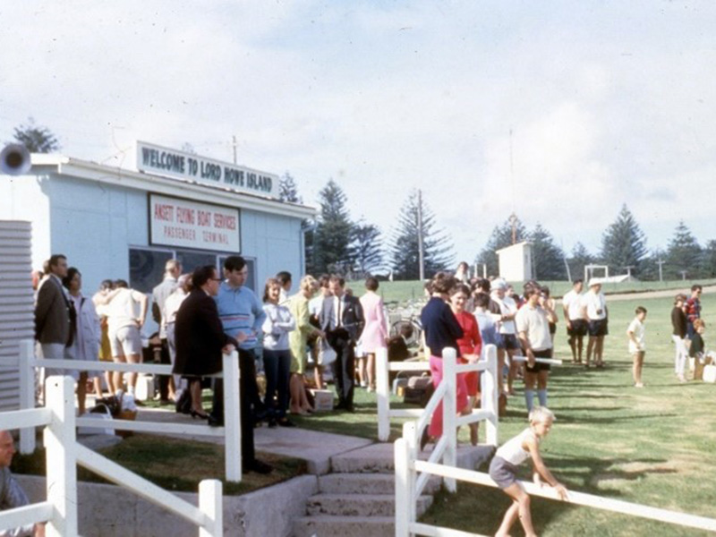 The new passenger terminal erected in 1959, with its ‘Welcome to Lord Howe Island’ sign and piped island music, became a bustling social hub whenever the flying boats arrived. Photos courtesy of the Chartres family and the LHI Museum