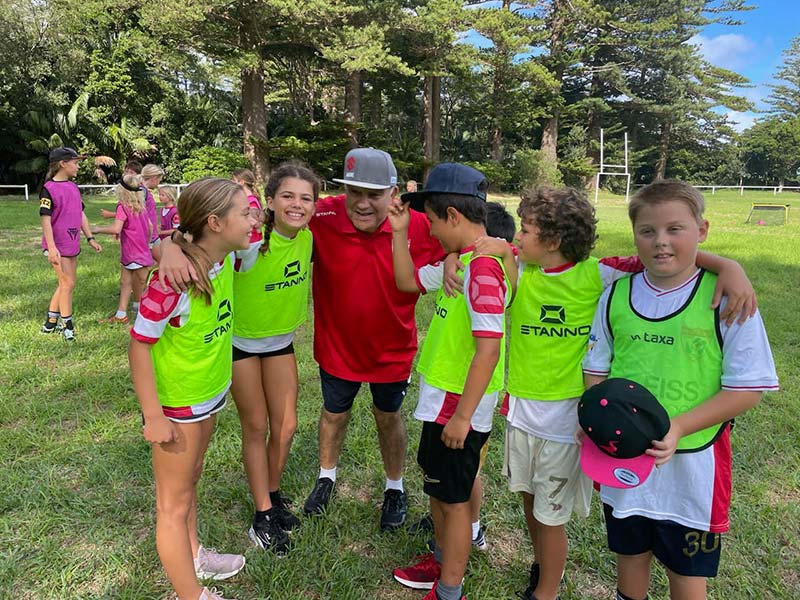 A group of children with their soccer coach at the recent Lord Howe Island soccer camp.