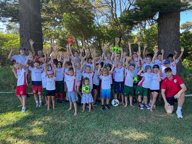 A group photo of all the children that recently attended the Lord Howe Island Soccer camp.