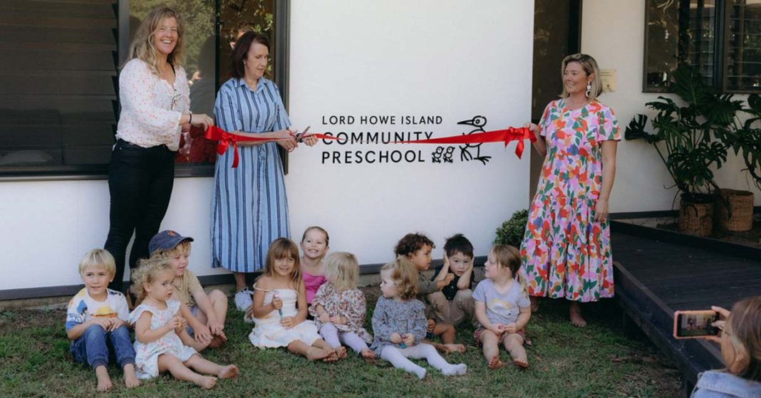 Cutting the ribbon at the opening of the new Lord Howe Island Preschool.