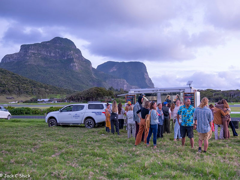 A group of people out enjoying the Potato in the Paddock event recently held on Lord Howe Island.