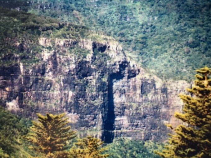 A cross on the side of a moutain