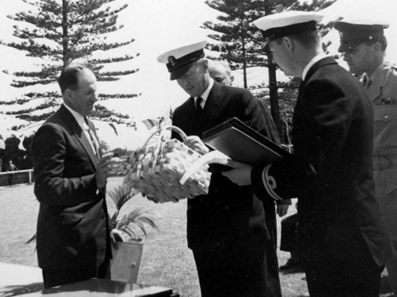 Jim Whistler represented the Island community at many official functions and is seen here presenting a locally made pandanus basket to Australian Governor General – Lord de Lisle – when he visited the Island in 1963. Photo courtesy of the LHI Historical Society