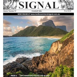 This is the front cover of the Lord Howe Island Signal for August 2024, Issue 117. It features an image which captures the stunning landscape of Lord Howe Island, featuring the prominent Mount Lidgbird and Mount Gower in the background. The Island's lush greenery, pristine beaches, and crystal-clear waters create a picturesque and serene environment.