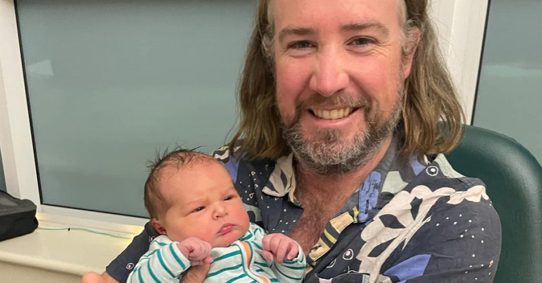 Proud dad Blake holds new daughter Banksia Betty Thompson