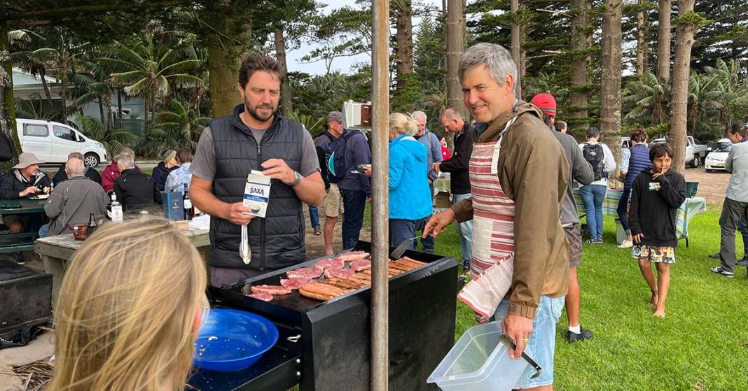 An image of residents and visitors enjoying the Classic Yacht BBQ